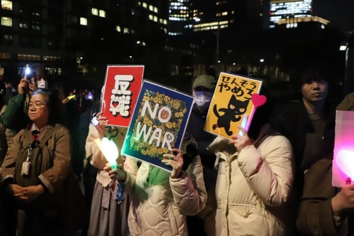 Japanese people protested against the prime minister’s dangerous policies in Tokyo. Japanese people protested against the prime minister’s dangerous policies in Tokyo.